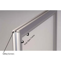 Safety-edge corner on sidewalk curb sign frame to help prevent injury if walked into.